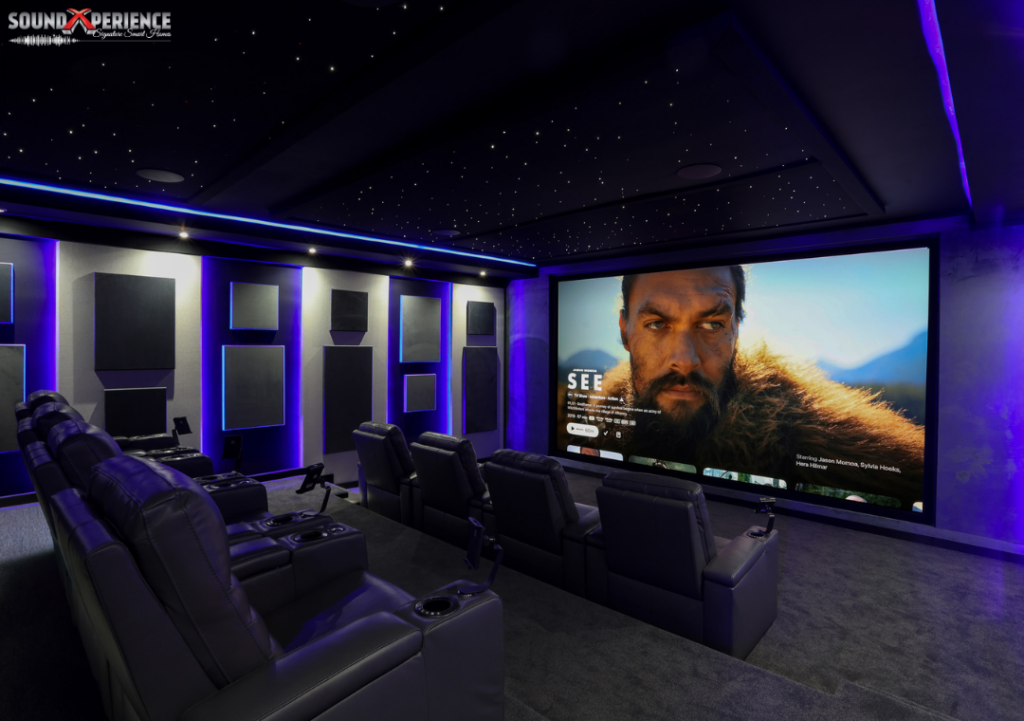 Home sound setup — home theatre room with surround speakers and acoustic panels